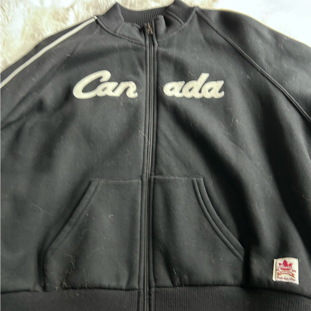 Roots Black Jacket with White and Burgundy Canada Crest - Picture 5 of 9